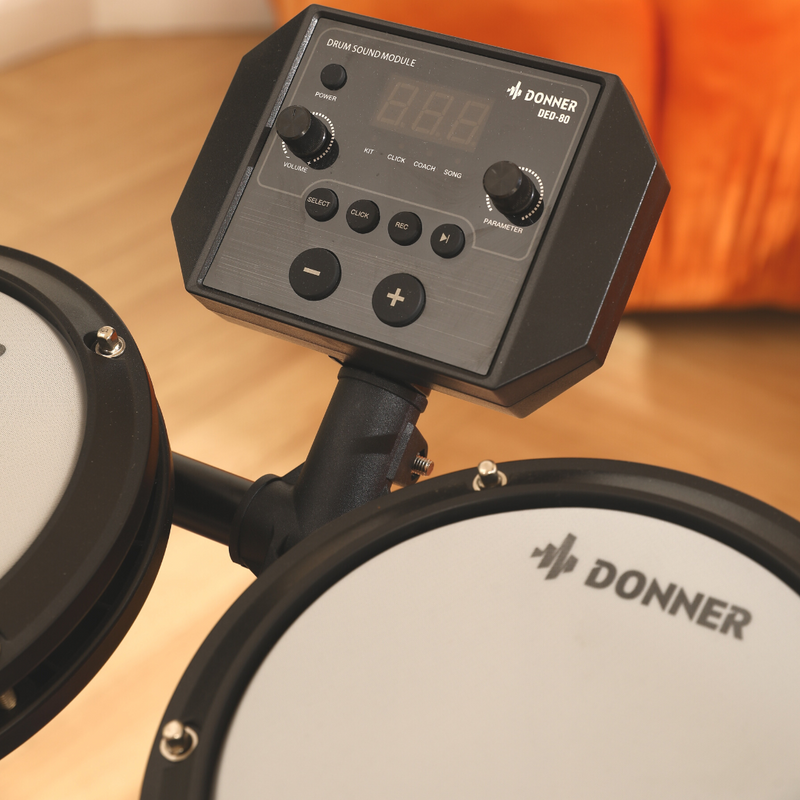 Donner DED-80 Kit de Batería Electrónica para principiantes con 180 sonidos, con parche silencioso y pedales de uso rudo, incluye banco, baquetas y audífonos, ligero y portátil